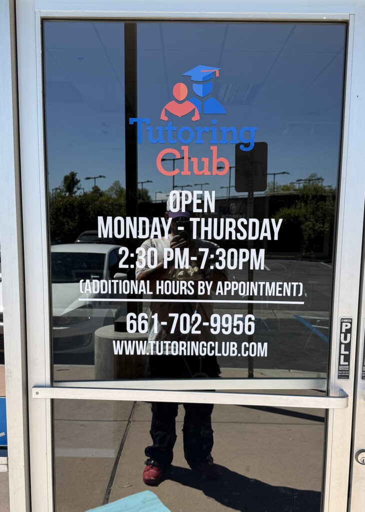 store hours sign for valencia tutoring company installed by stay up sign co.